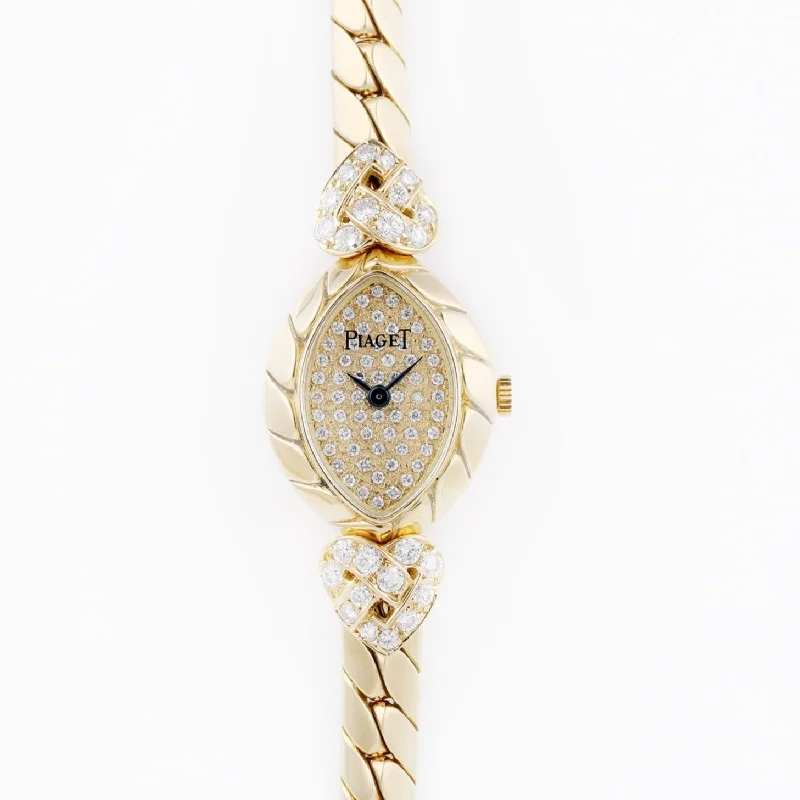 Piaget Vintage Ladies Diamond Wristwatch | REF. 49250 V 102 | Pave Diamond Dial | Oval-Shaped Case | 18k Yellow Gold | 1980's